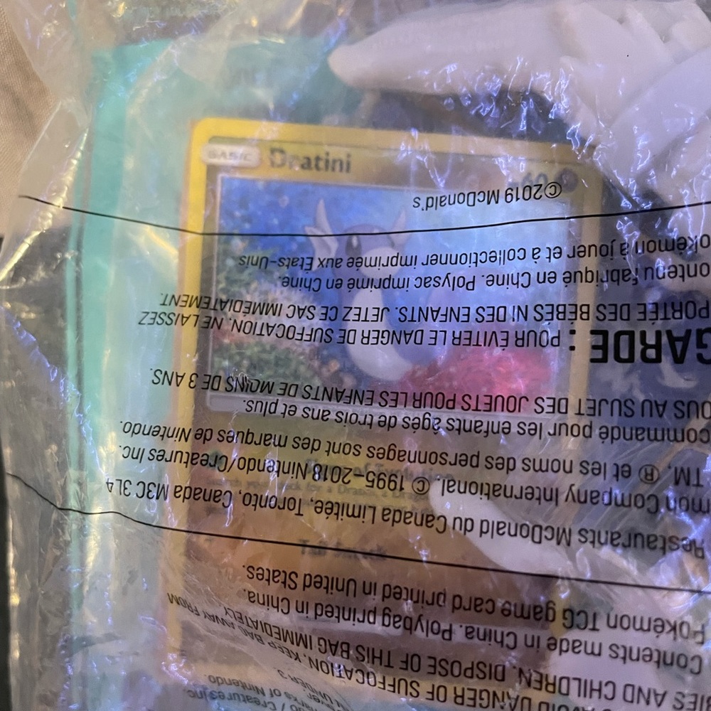 Brand new never opened happy meal Pokémon card and toy limited edition 2018